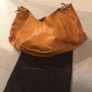 Bottega Venetia yellow/mustard leather handbag.